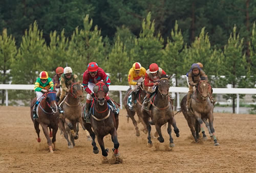 Racing at the Yulong racecourse in the Chinese county of Youyu in the Shanxi Province.